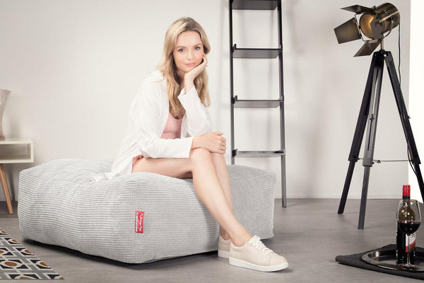 CloudSac 250 Memory Foam Ottoman Pouf - Pom Pom Ivory Fabric Close-up Image
